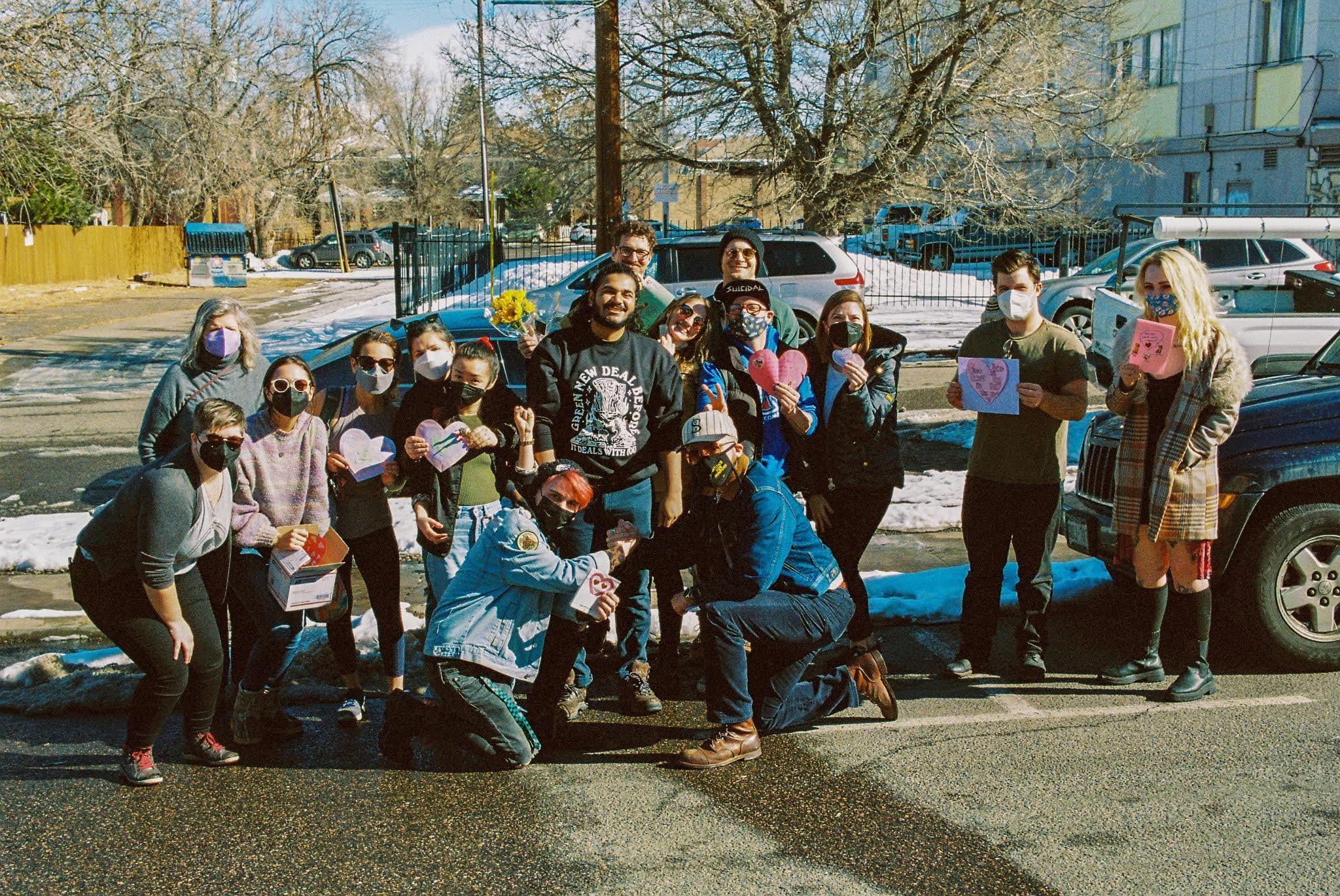 Denver DSA members delivering valentines.